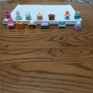 Lot of 13 Shopkins. Various themes.  GUC.